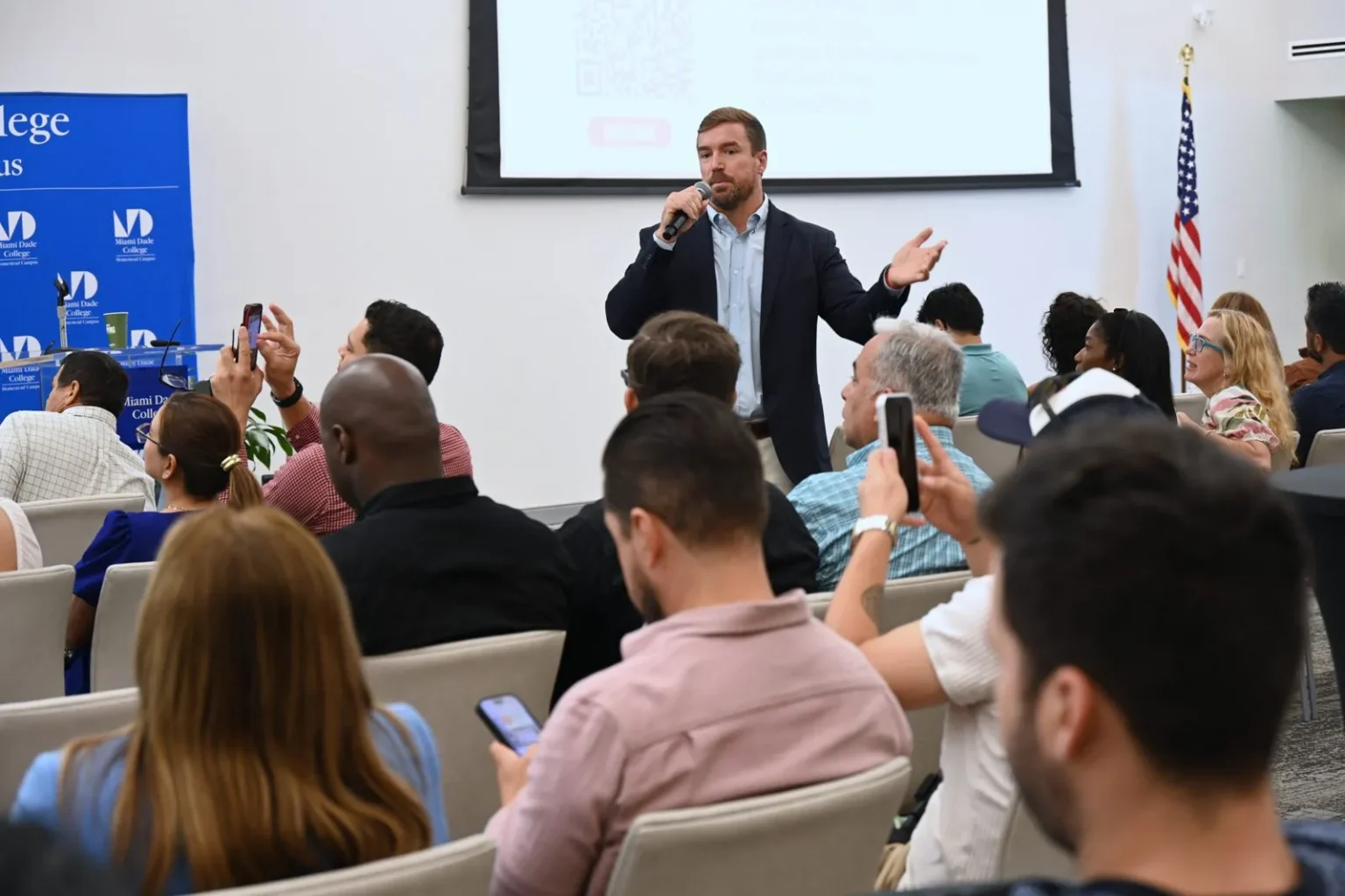 Dr. Claude Kershner delivering a talk to a full room at the South Dade Business Resource Expo